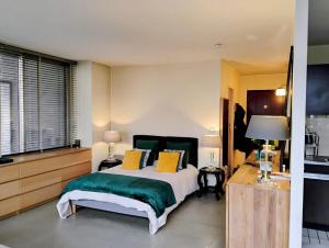 Postel nebo postele na pokoji v ubytování Bordeaux - Appartement avec terrasse