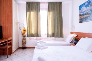 Posteľ alebo postele v izbe v ubytovaní Hotel New Aurora Venice