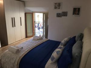 Postel nebo postele na pokoji v ubytování La Tana Dei Leoni Affittacamere
