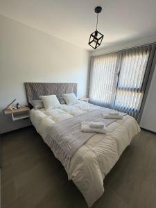 En eller flere senge i et værelse på Ruka 10 - Andarlibre