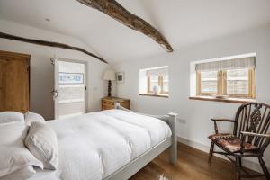 Voodi või voodid majutusasutuse Barn Owl Cottage, Field Dalling toas