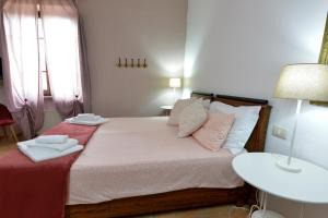 Postel nebo postele na pokoji v ubytování Borgo Faldo - Monolocale con Cucina - 119