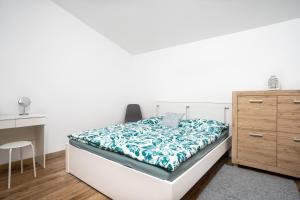 Postel nebo postele na pokoji v ubytování Dom Joves