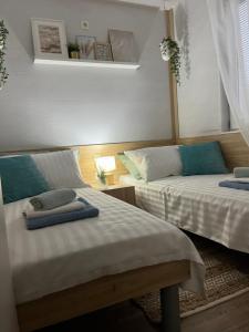 Postel nebo postele na pokoji v ubytování MARIS MOBILE HOME