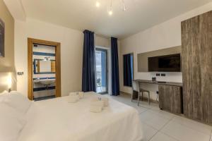 Letto o letti in una camera di Hotel Belvedere