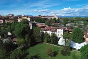 an aerial view of a city with a park at Hotel Julia in Cassano dʼAdda