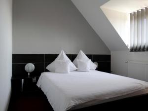 Postel nebo postele na pokoji v ubytování Prince Hotel + 37 fotografií