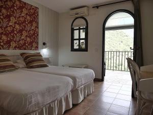 Posteľ alebo postele v izbe v ubytovaní Posada Real Quinta de la Concepción