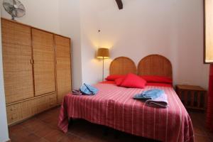 Łóżko lub łóżka w pokoju w obiekcie Villa Tresino B&B