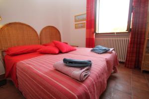Łóżko lub łóżka w pokoju w obiekcie Villa Tresino B&B