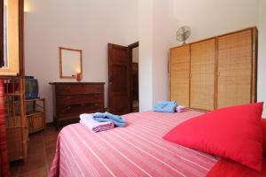 Łóżko lub łóżka w pokoju w obiekcie Villa Tresino B&B