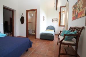 Łóżko lub łóżka w pokoju w obiekcie Villa Tresino B&B