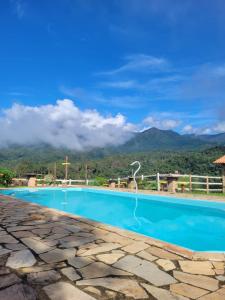 Hồ bơi trong/gần Pousada Alto da Coruja