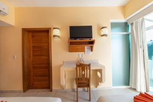 Μια τηλεόραση ή/και κέντρο ψυχαγωγίας στο Casa Danna Huatulco