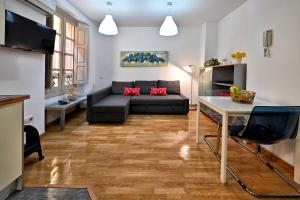TV a/nebo společenská místnost v ubytování Apartamento Mitcentro