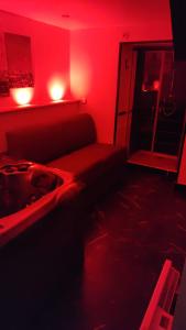 Posezení v ubytování Chambre privée Cosy à proximité de Roissy, Parc Astérix