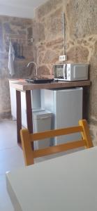 A kitchen or kitchenette at Hostal Casa Martinez