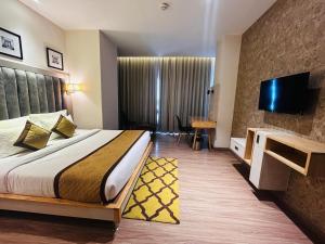 TV a/nebo společenská místnost v ubytování Hotel Sakura Gold