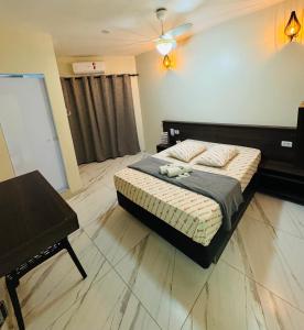 Postel nebo postele na pokoji v ubytování Hotel Patriarca