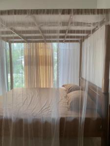 Postel nebo postele na pokoji v ubytování Miringa homestay