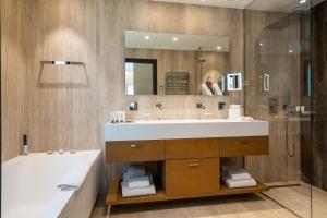 Ванная комната в Villa Cosy, hotel & spa