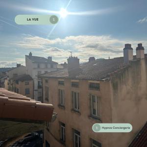 a view of a city from a building at Le Premier Pas, départ du Saint Jacques in Le Puy en Velay