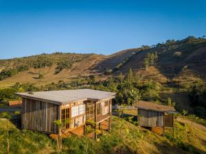 a house on top of a hill at Ibiti Village in Lima Duarte +220 photos