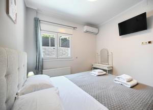 Imagem da galeria de Ionian Edge Apartments em Nikiana mais 39 fotografias