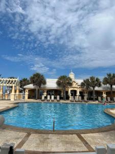 a large swimming pool in front of a resort at Blue Bayou in Gulf Highlands