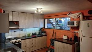 Η κουζίνα ή μικρή κουζίνα στο Nuestracasa