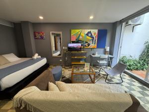 Voodi või voodid majutusasutuse Casa Bugambilia - Alma Hotels toas