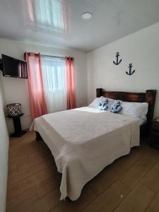 En eller flere senge i et værelse på Villa Congo 6 near the peñon guacalillo + 37 billeder