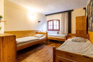 Posteľ alebo postele v izbe v ubytovaní Hostel Orange
