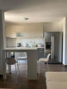 Η κουζίνα ή μικρή κουζίνα στο Biljarda Apartments +17 φωτογραφίες
