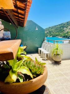 Πισίνα στο ή κοντά στο Cobertura vista praia