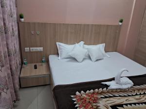 Postel nebo postele na pokoji v ubytování Shushila home stay