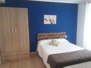 Postel nebo postele na pokoji v ubytování Hotel Abrego Reinosa