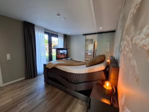 Postel nebo postele na pokoji v ubytování Bed & Breakfast Ermelosche Heide