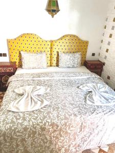 Voodi või voodid majutusasutuse Sun Hostel toas