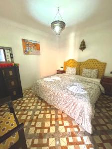 Voodi või voodid majutusasutuse Sun Hostel toas