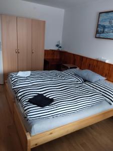 Postel nebo postele na pokoji v ubytování Benecko 131 + 6 fotografií