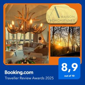 a picture of a living room with a large antler chandelier at Maison Tronchiennes in Durbuy