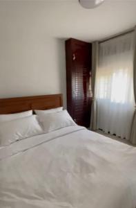 Postel nebo postele na pokoji v ubytování Ama Nest