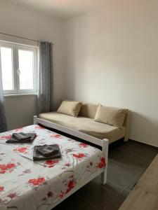 Postel nebo postele na pokoji v ubytování Mariyka Apartaments 2