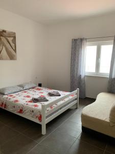 Postel nebo postele na pokoji v ubytování Mariyka Apartaments 2