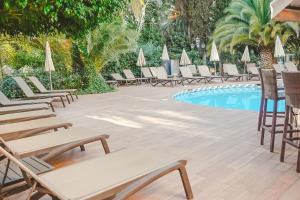 The swimming pool at or close to Lago Garden Apart-Suites & Spa Hotel