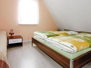 Ένα ή περισσότερα κρεβάτια σε δωμάτιο στο Ferienhaus, Teßmannsdorf