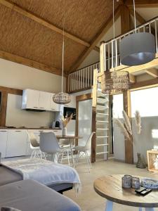 Posezení v ubytování Chalet Hoge Kempen