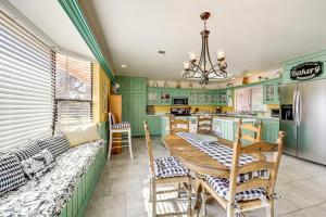a kitchen with green cabinets and a table and chairs at Pleasant Valley Wine Trail Home - Near Paso Robles in San Miguel