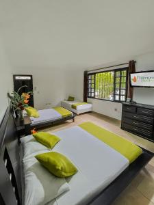 Postel nebo postele na pokoji v ubytování Hotel Premium Real